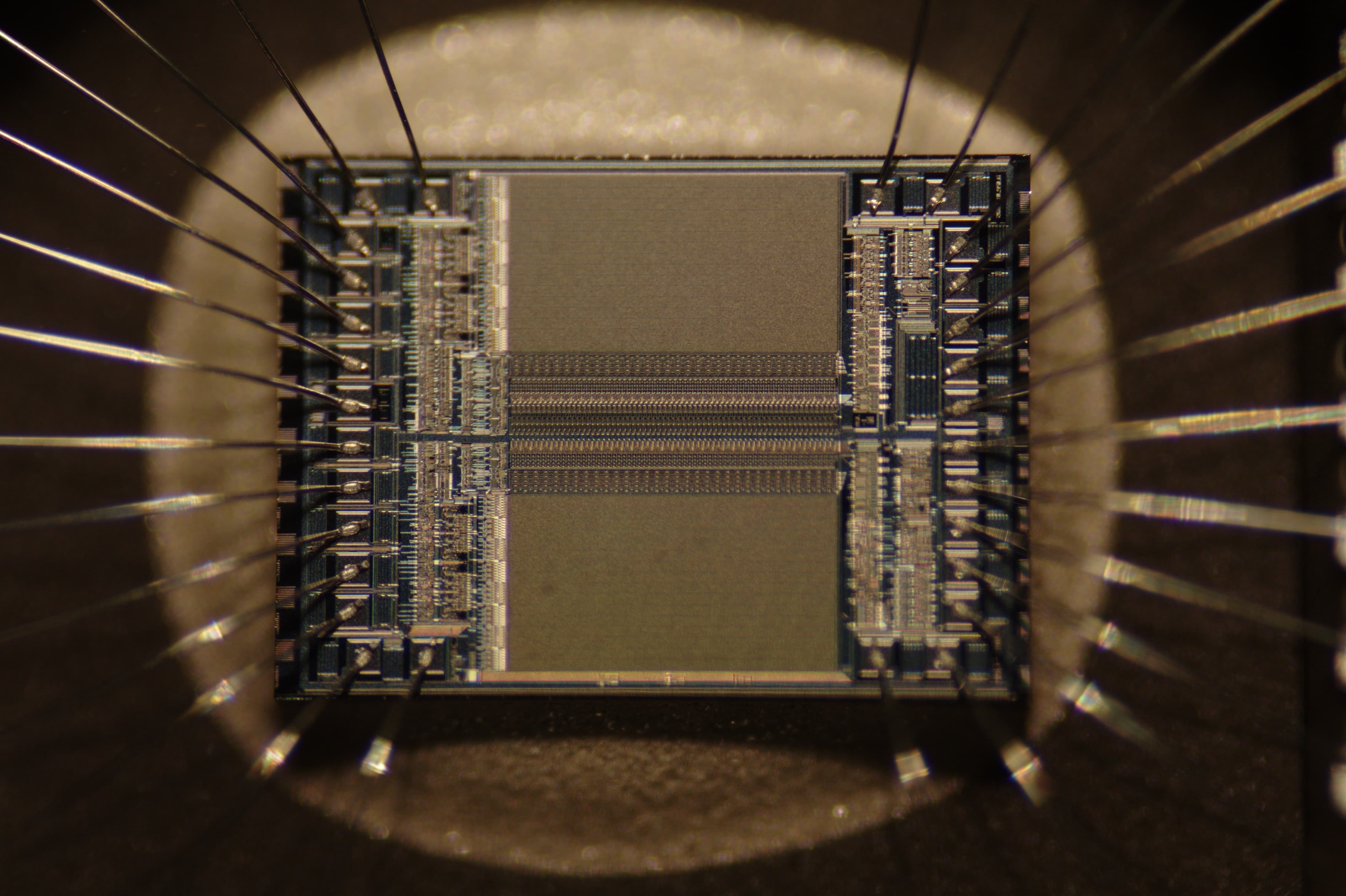 A macro shot showing the fine detail of the integrated circuit inside one EPROM chip